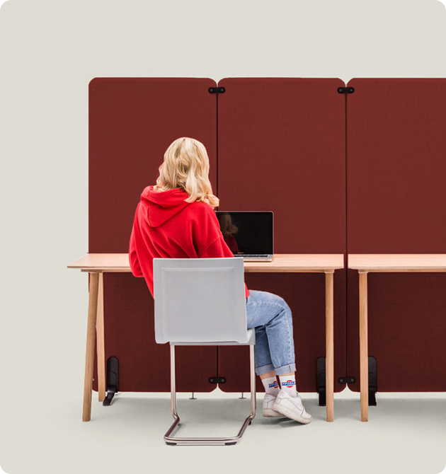 Mute Duo screens in row standing behind a workstation