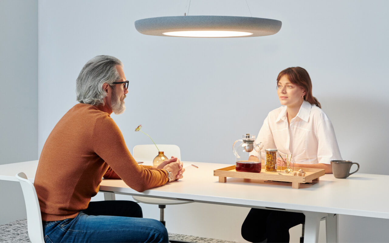 Mute Loop lamp in Conference Interior, with people talking