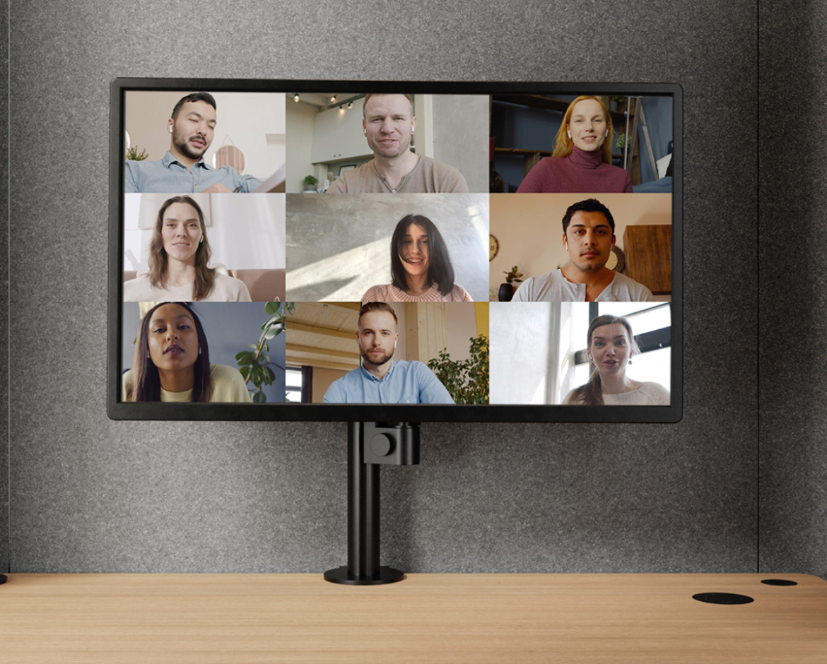 Videocall feature in Space M acoustic pod - interior with desktop and third-party monitor